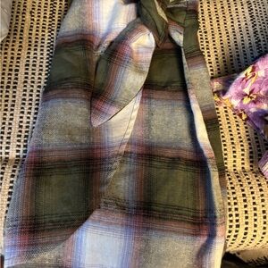 Plaid skirt with bow tie in front.